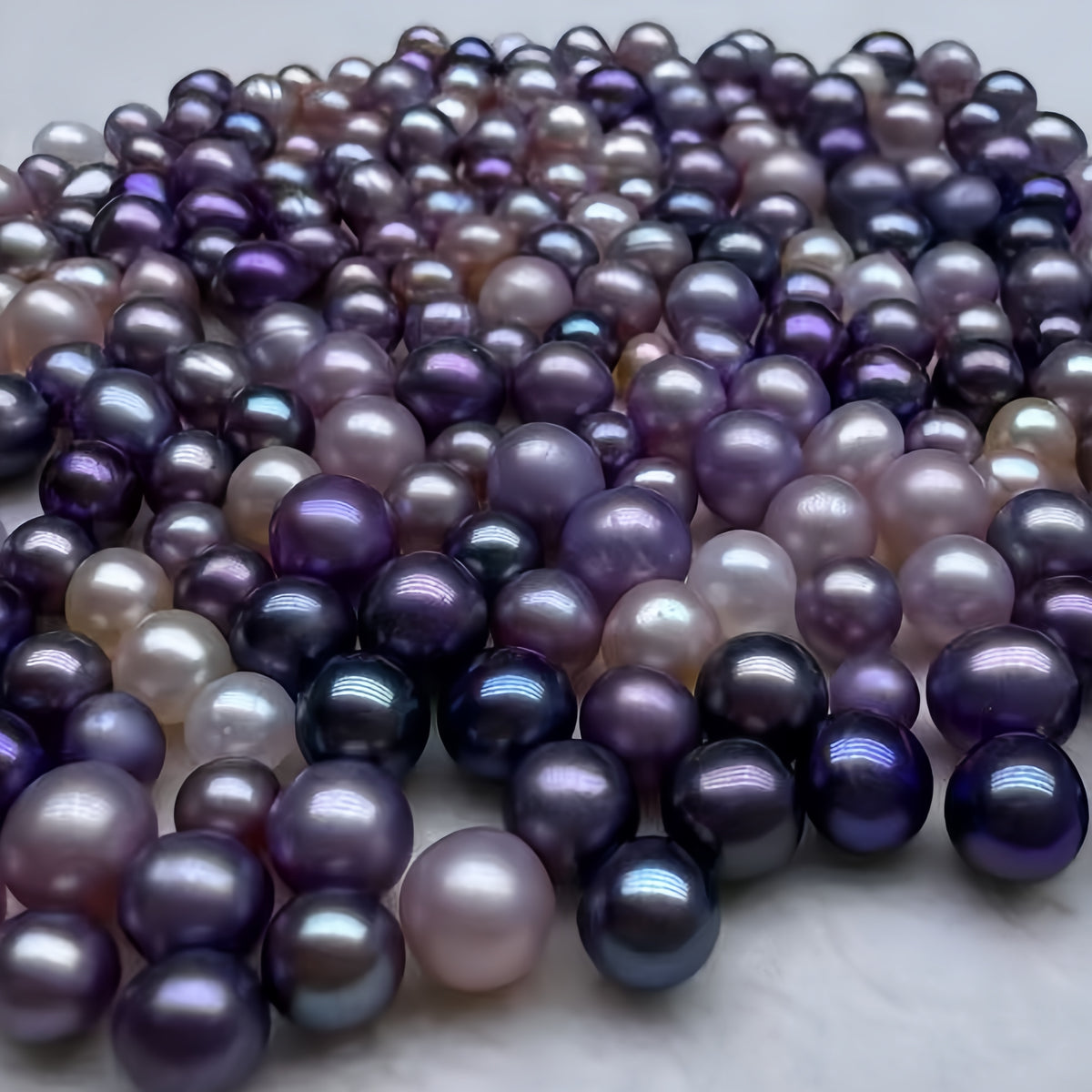 A05. Royal Purple AK Pearl Clam (15–25 Ak Pearls ) – Size: 4–7mm